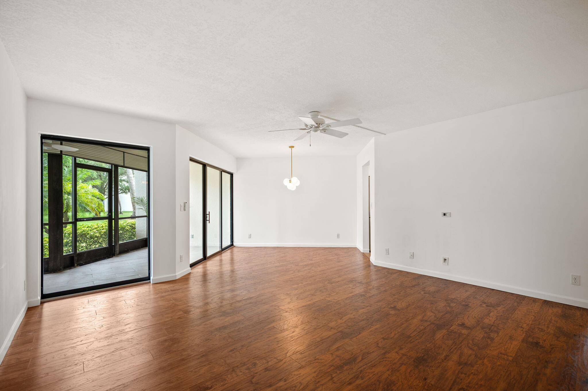 5701 Camino Del Sol, Unit 104 Boca Raton, FL 33433 - Photo 8 of 34 living and dinning room