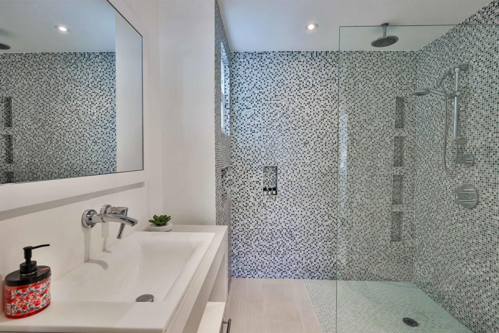 942 D Avenue, Unit B Coronado, CA 92118 - Photo 17 of 38 a bathroom with a bathtub and shower