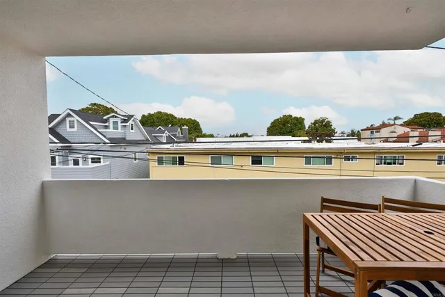 a view of a room with a table and chair