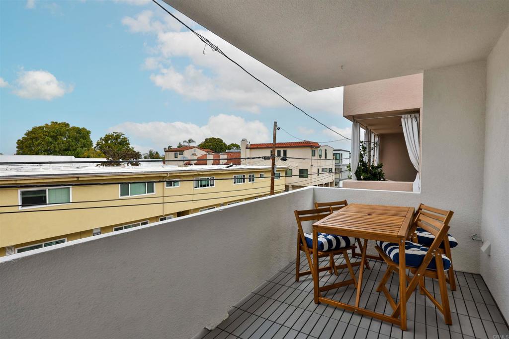 942 D Avenue, Unit B Coronado, CA 92118 - Photo 29 of 38 a view of a chairs and table on the terrace