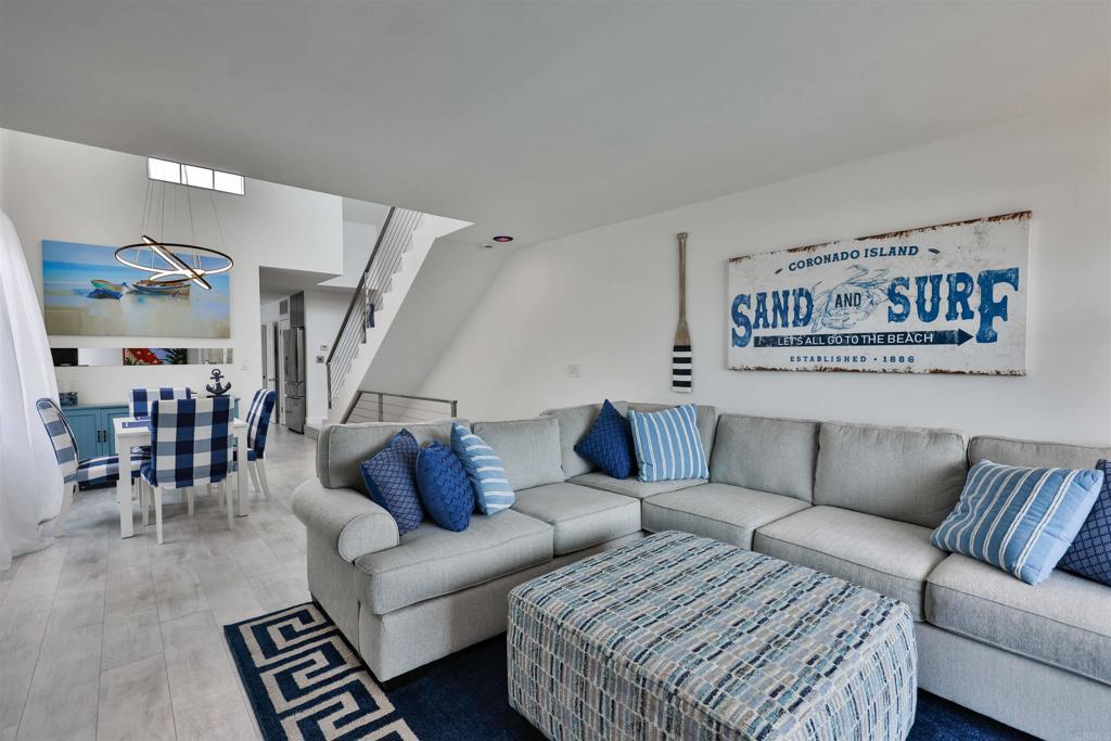 942 D Avenue, Unit B Coronado, CA 92118 - Photo 3 of 38 a living room with furniture and wooden floor