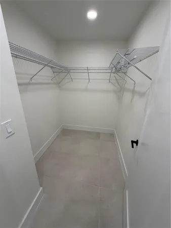 a view of a room with racks on the wall