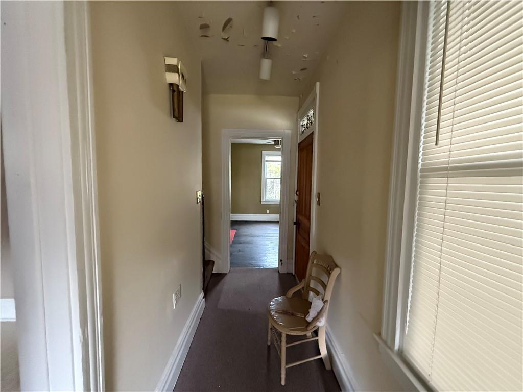 136 Queen Street Kittanning, PA 16201 - Photo 8 of 29 a view of a livingroom with furniture and windows