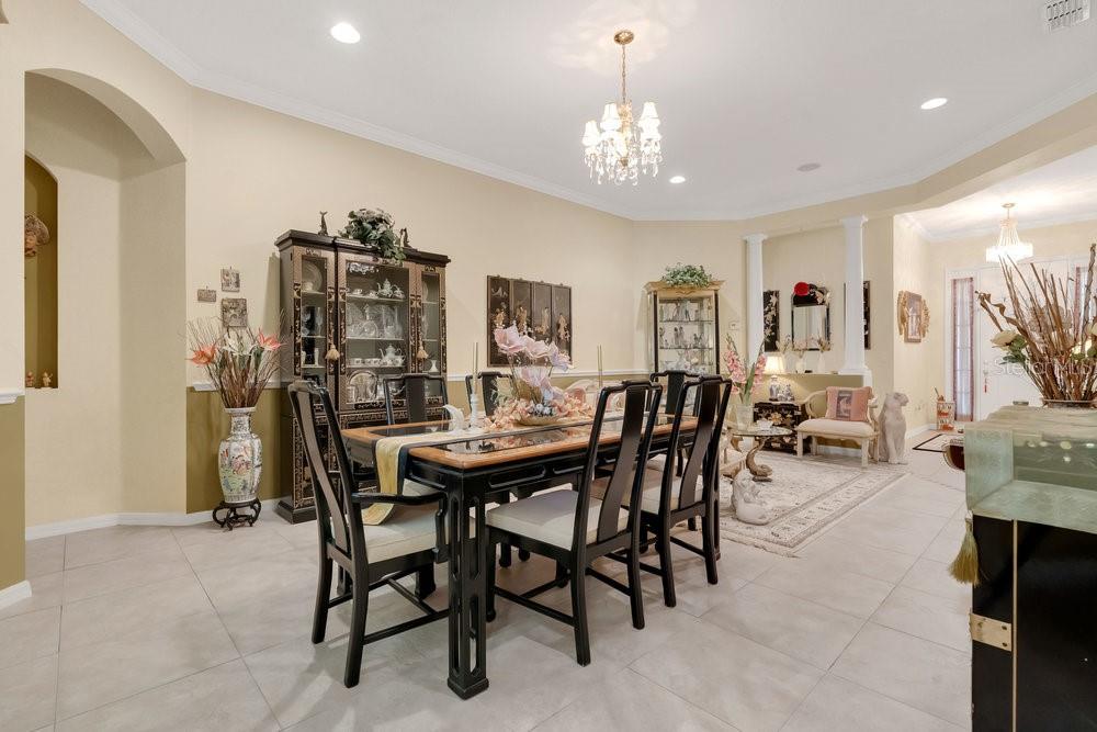 6139 Andreozzi Lane Windermere, FL 34786 - Photo 12 of 53 a view of a dining room with furniture