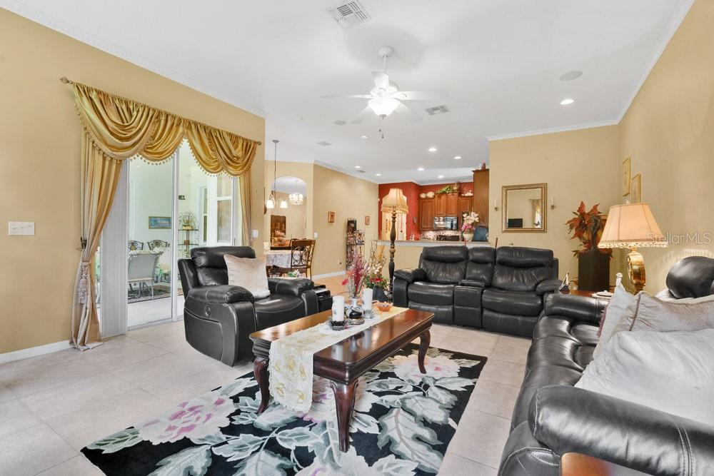6139 Andreozzi Lane Windermere, FL 34786 - Photo 17 of 53 a living room with lots of furniture and view of kitchen
