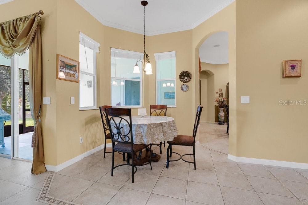 6139 Andreozzi Lane Windermere, FL 34786 - Photo 20 of 53 a dining room with furniture and window