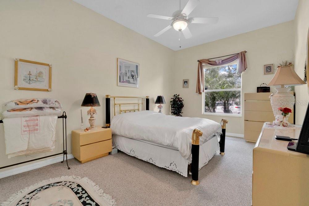 6139 Andreozzi Lane Windermere, FL 34786 - Photo 31 of 53 a bed room with a bed and a couch