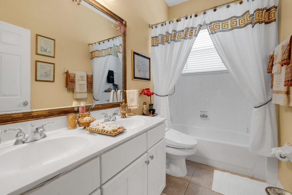 6139 Andreozzi Lane Windermere, FL 34786 - Photo 34 of 53 a bathroom with a sink toilet tub and shower