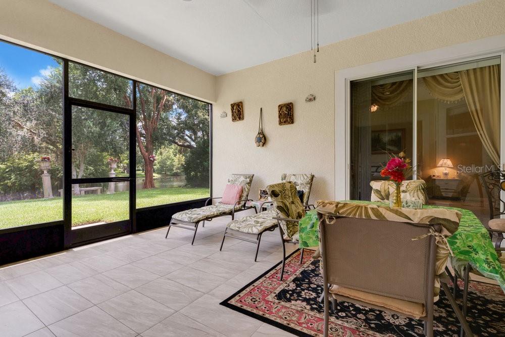 6139 Andreozzi Lane Windermere, FL 34786 - Photo 37 of 53 a living room with furniture and a large window