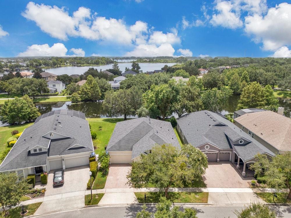 6139 Andreozzi Lane Windermere, FL 34786 - Photo 41 of 53 an aerial view of multiple houses with yard