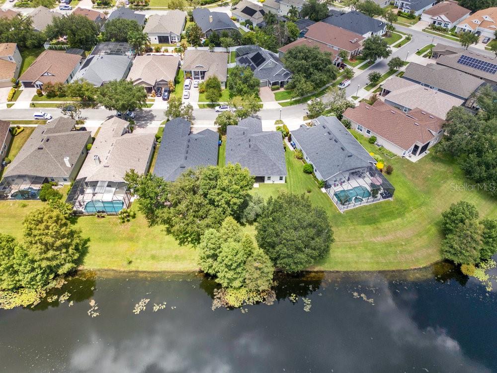 6139 Andreozzi Lane Windermere, FL 34786 - Photo 46 of 53 an aerial view of residential houses with outdoor space and street view