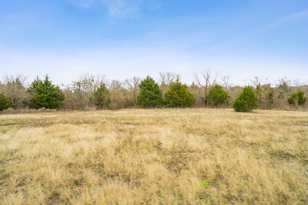 4505 Merritt Road Sachse, TX 75048 - Photo 18 of 22 a view of a yard
