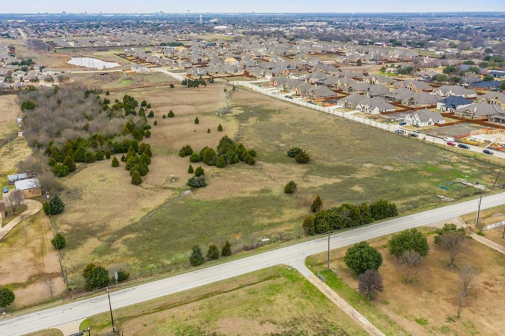 4505 Merritt Road Sachse, TX 75048 - Photo 3 of 22 an aerial view of residential houses with outdoor space