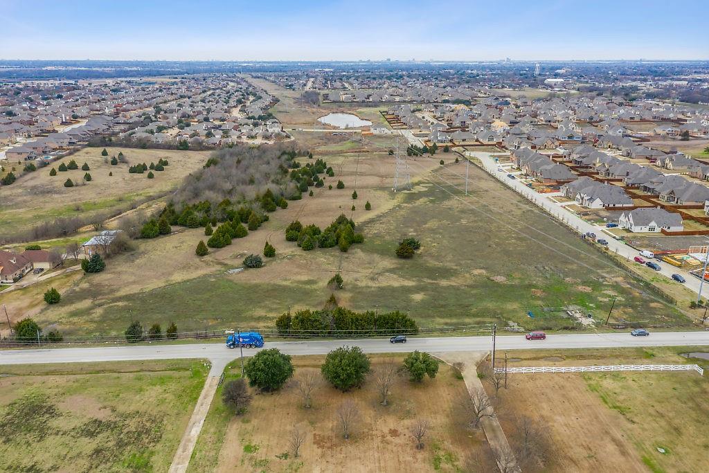 4505 Merritt Road Sachse, TX 75048 - Photo 4 of 22 an aerial view of residential houses with outdoor space
