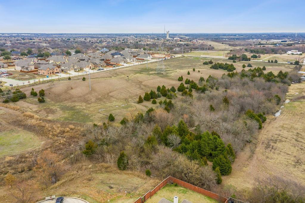 4505 Merritt Road Sachse, TX 75048 - Photo 7 of 22 an aerial view of residential houses with outdoor space