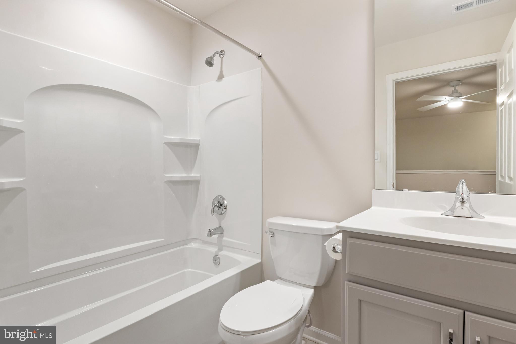 113 Garrison Drive Morganton, NC 28655 - Photo 29 of 63 a bathroom with a sink toilet and shower