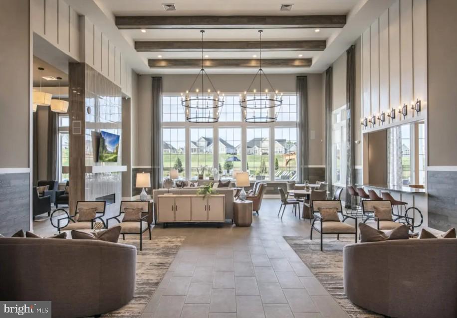 113 Garrison Drive Morganton, NC 28655 - Photo 47 of 63 a living room with furniture and floor to ceiling windows