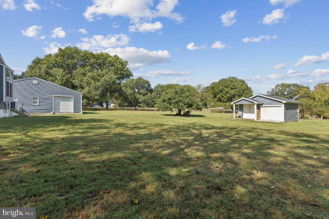 8368 Brock Bridge Road Laurel, MD 20724 - Photo 29 of 37 a front view of a house with a yard