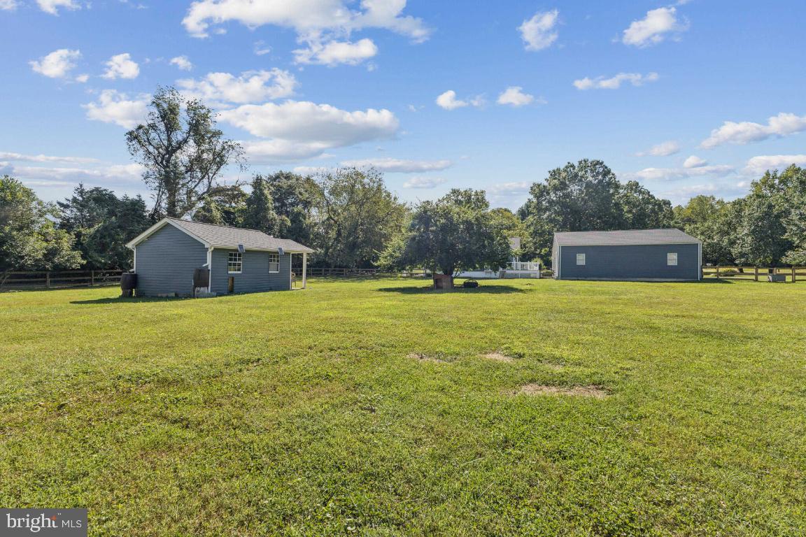 8368 Brock Bridge Road Laurel, MD 20724 - Photo 30 of 37 a view of a house with a yard