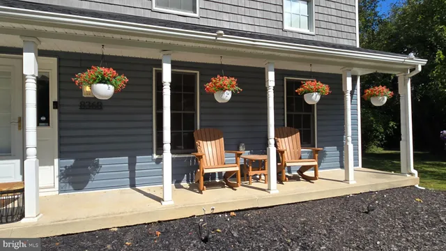 a view of a building with sitting area