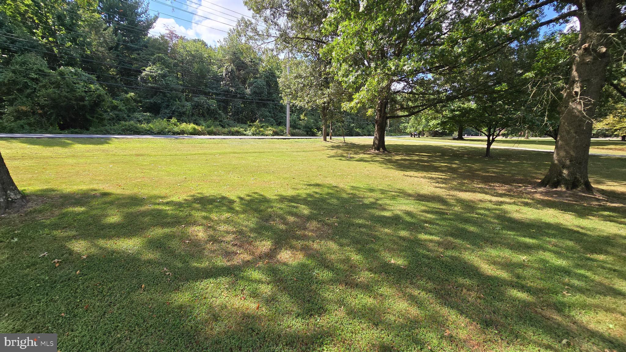 8368 Brock Bridge Road Laurel, MD 20724 - Photo 31 of 37 a view of outdoor space with trees