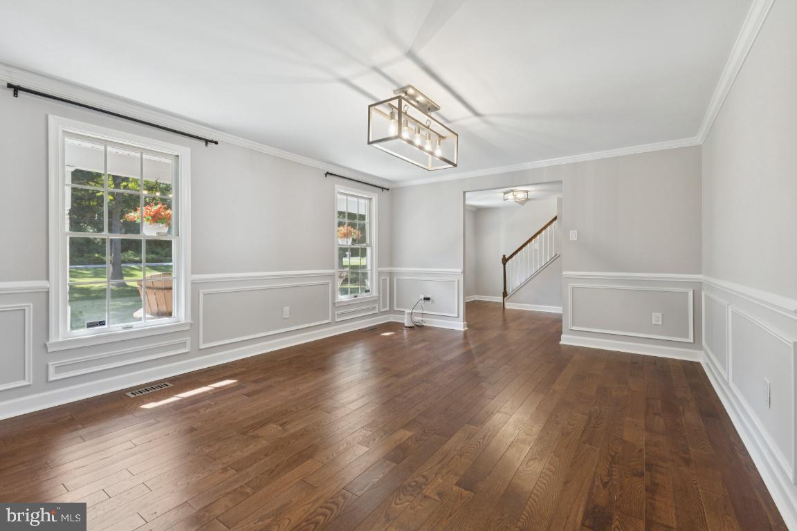 8368 Brock Bridge Road Laurel, MD 20724 - Photo 7 of 37 a view of empty room with wooden floor and fan