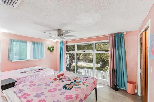 a bathroom with a shower sink and mirror