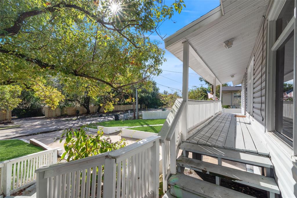 2508 Good Homes Road Orlando, FL 32818 - Photo 3 of 30 a view of a wooden deck and a backyard