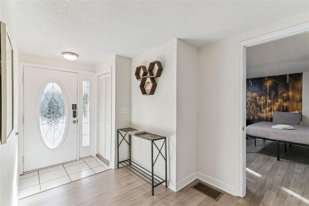2508 Good Homes Road Orlando, FL 32818 - Photo 4 of 30 a view of an entryway with wooden floor