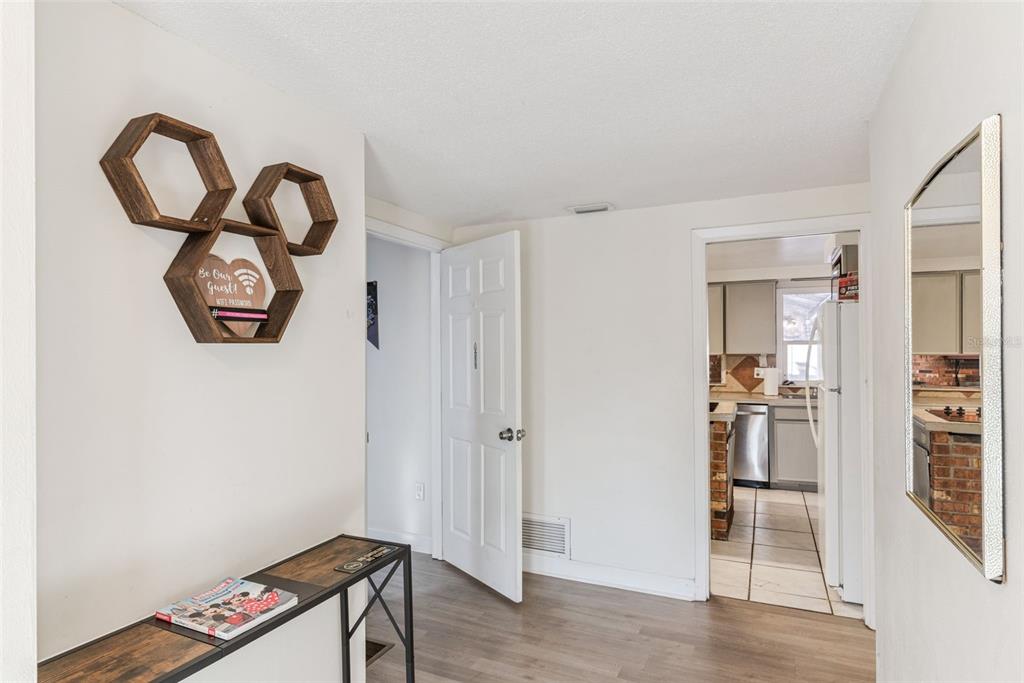 2508 Good Homes Road Orlando, FL 32818 - Photo 6 of 30 a view of an entryway with wooden floor