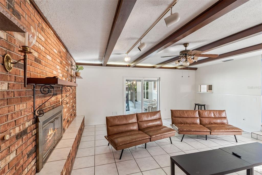 2508 Good Homes Road Orlando, FL 32818 - Photo 7 of 30 a outdoor space with lots of furniture and a rug