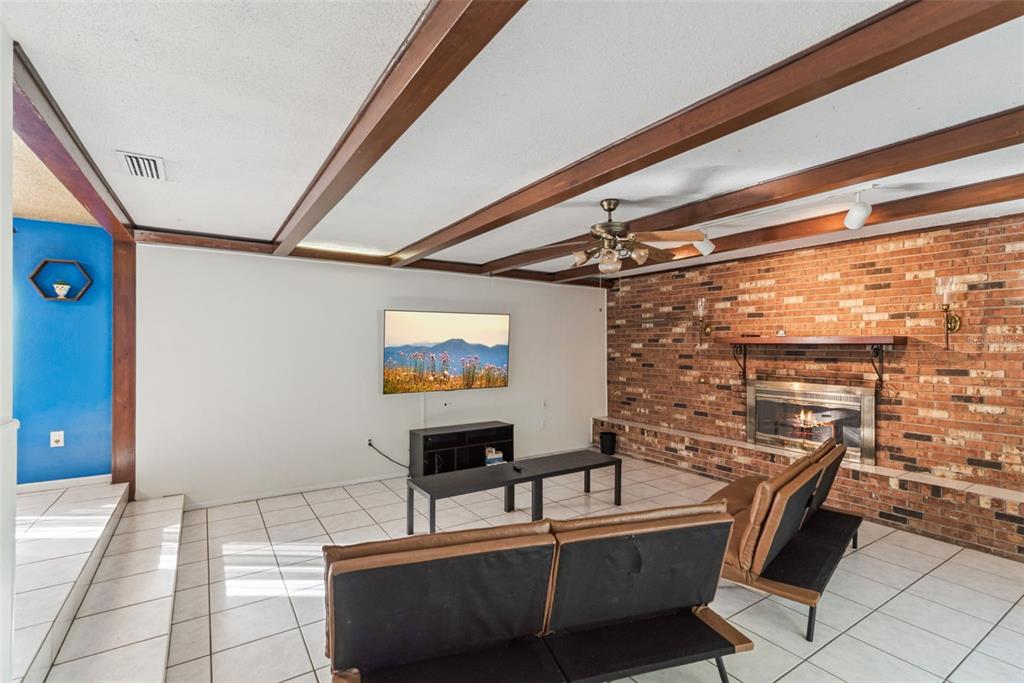 2508 Good Homes Road Orlando, FL 32818 - Photo 9 of 30 a room with pool table and windows