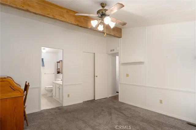 a bathroom with a sink toilet and vanity