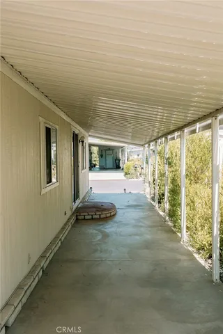 a bedroom with bed and a window