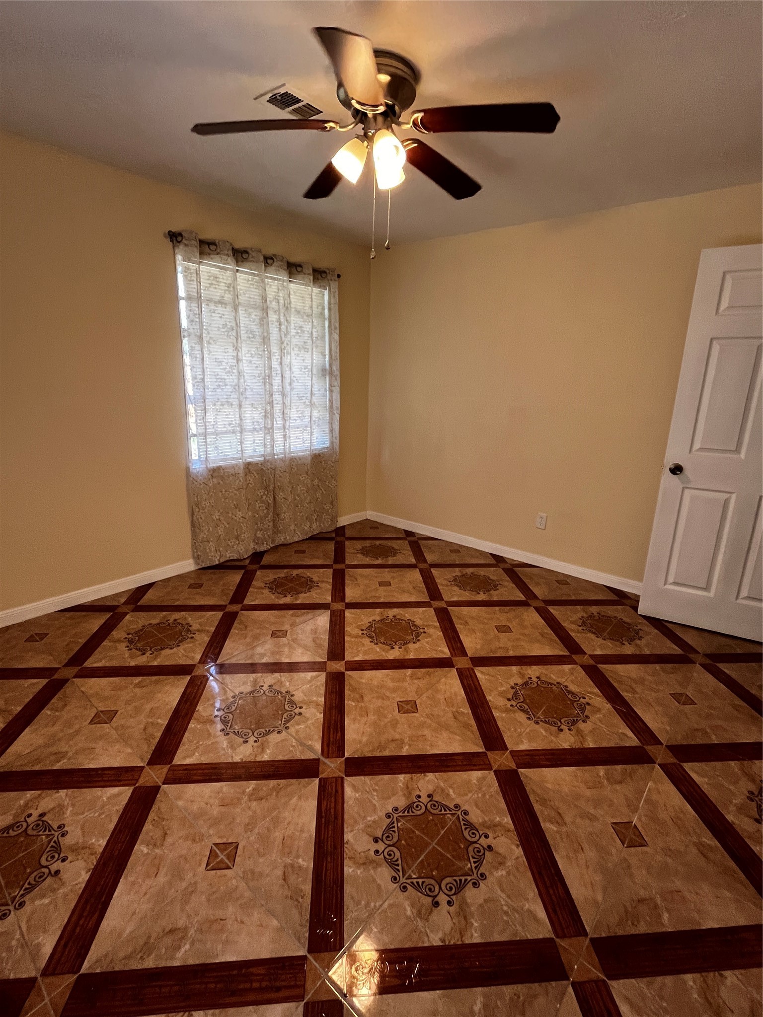 3163 Roe Drive Houston, TX 77087 - Photo 40 of 47 a bedroom with a bed and a window