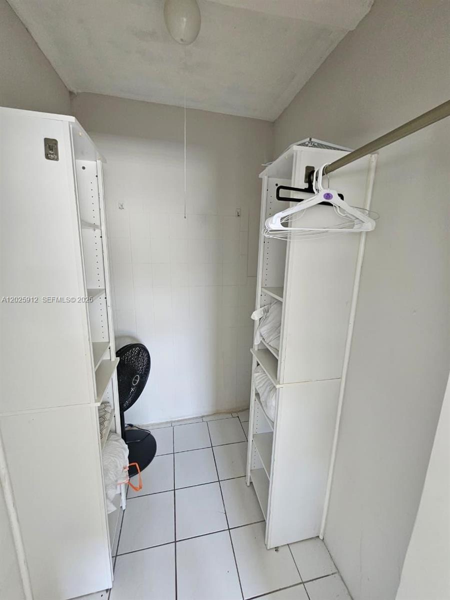 2224 Southwest 11th Street, Unit 3 Miami, FL 33135 - Photo 9 of 15 a bathroom with a sink and a shower