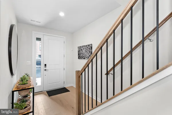 a view of entryway with stairs