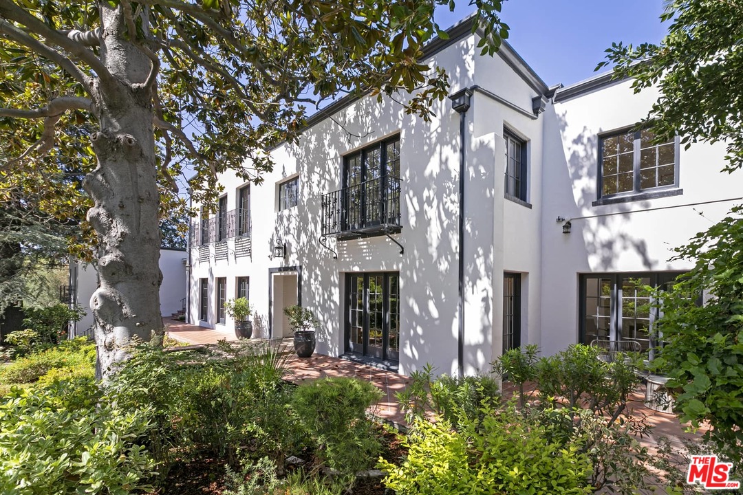 2529 North Commonwealth Avenue Los Angeles, CA 90027 - Photo 1 of 37 a view of a brick building next to a yard
