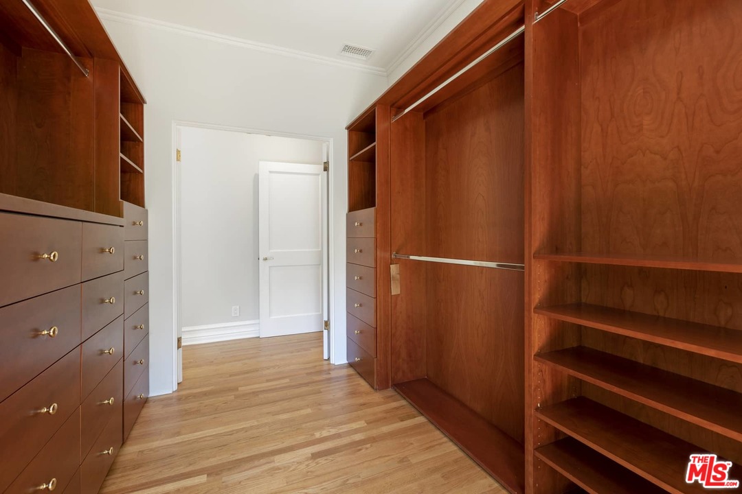 2529 North Commonwealth Avenue Los Angeles, CA 90027 - Photo 19 of 37 a view of walk in closet with wooden floor