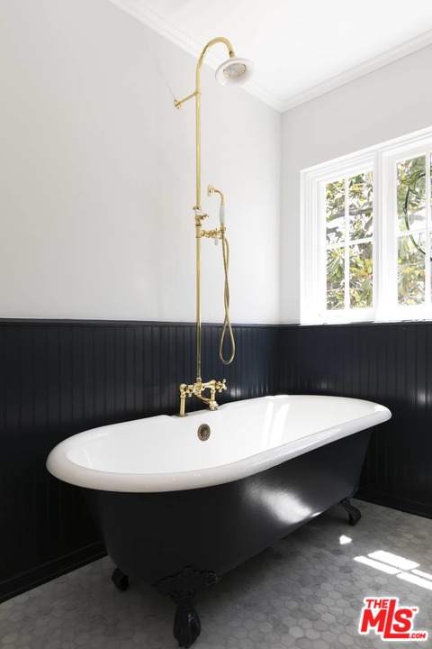 2529 North Commonwealth Avenue Los Angeles, CA 90027 - Photo 21 of 37 a bathroom with a sink and a mirror