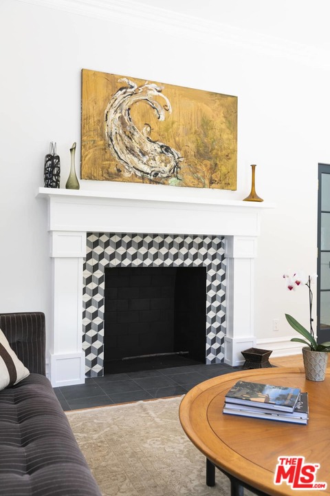 2529 North Commonwealth Avenue Los Angeles, CA 90027 - Photo 5 of 37 a living room with furniture and a fireplace