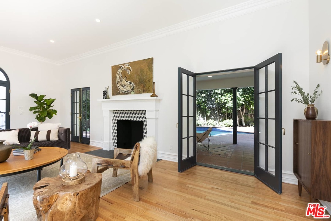 2529 North Commonwealth Avenue Los Angeles, CA 90027 - Photo 6 of 37 a living room with furniture and a fireplace