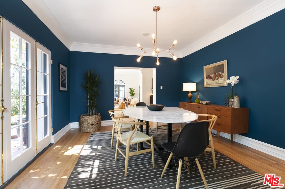 2529 North Commonwealth Avenue Los Angeles, CA 90027 - Photo 7 of 37 a view of a dining room with furniture window and wooden floor