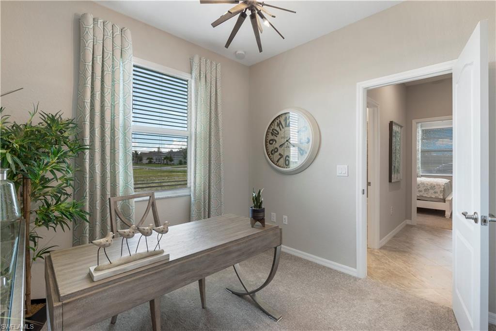 16100 Bonita Landing Circle Bonita Springs, FL 34135 - Photo 17 of 28 a view of a room with a large window table and chairs