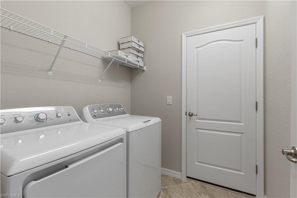 16100 Bonita Landing Circle Bonita Springs, FL 34135 - Photo 22 of 28 a utility room with dryer and washer