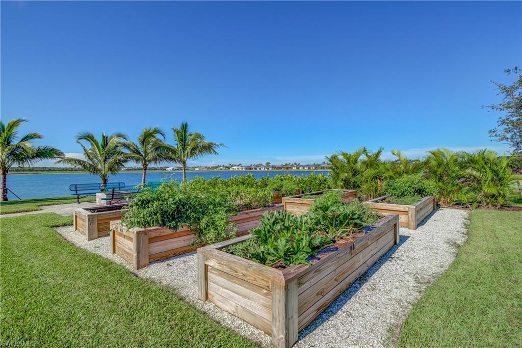 16100 Bonita Landing Circle Bonita Springs, FL 34135 - Photo 25 of 28 a garden view with a seating space