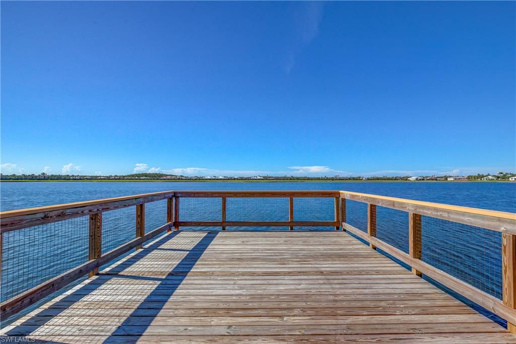 16100 Bonita Landing Circle Bonita Springs, FL 34135 - Photo 27 of 28 a view of balcony with wooden floor and ocean view