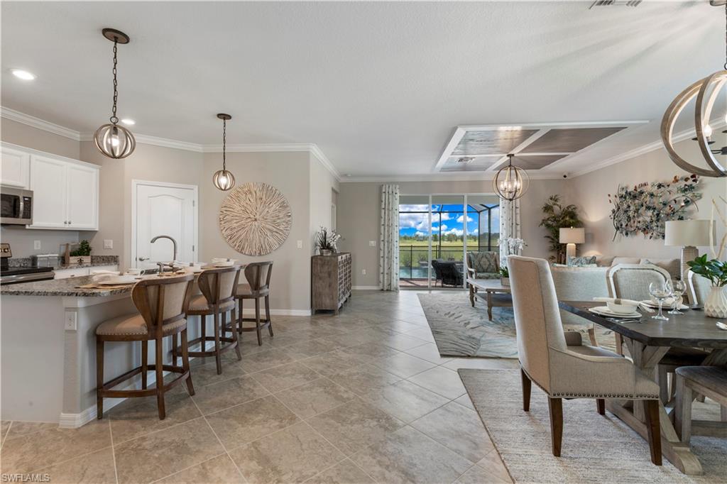 16100 Bonita Landing Circle Bonita Springs, FL 34135 - Photo 3 of 28 a view of a dining area with furniture