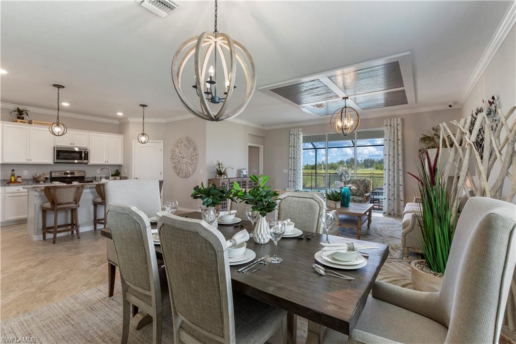 16100 Bonita Landing Circle Bonita Springs, FL 34135 - Photo 6 of 28 a view of a dining room with furniture window and wooden floor
