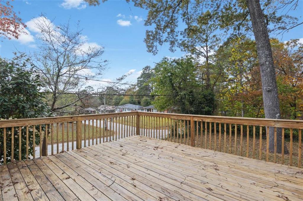 701 Daniel Avenue Decatur, GA 30032 - Photo 28 of 29 a view of wooden deck and a yard